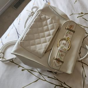 Cream backpack with floral design